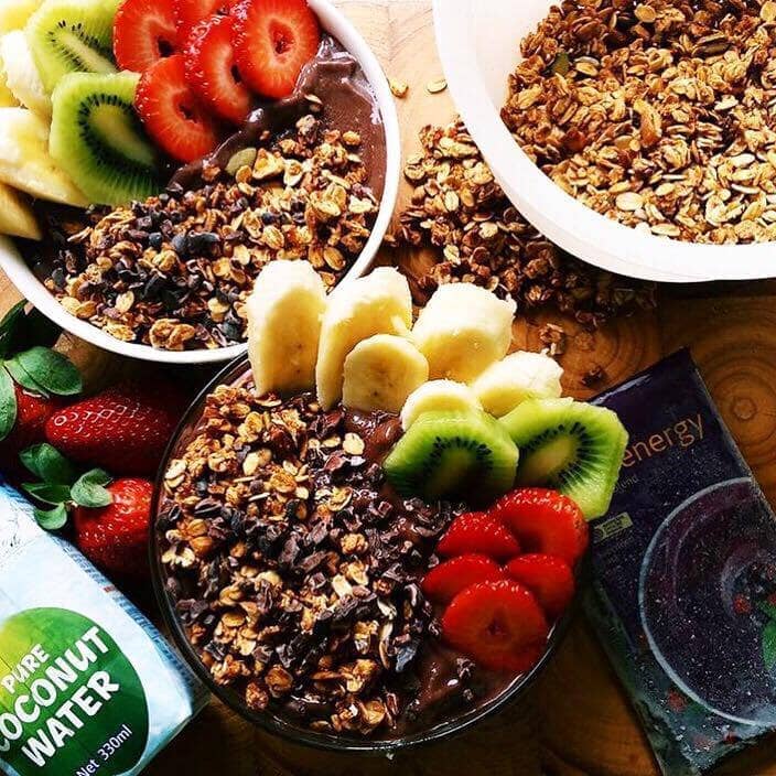 3 Acai bowls with fruit and toppings